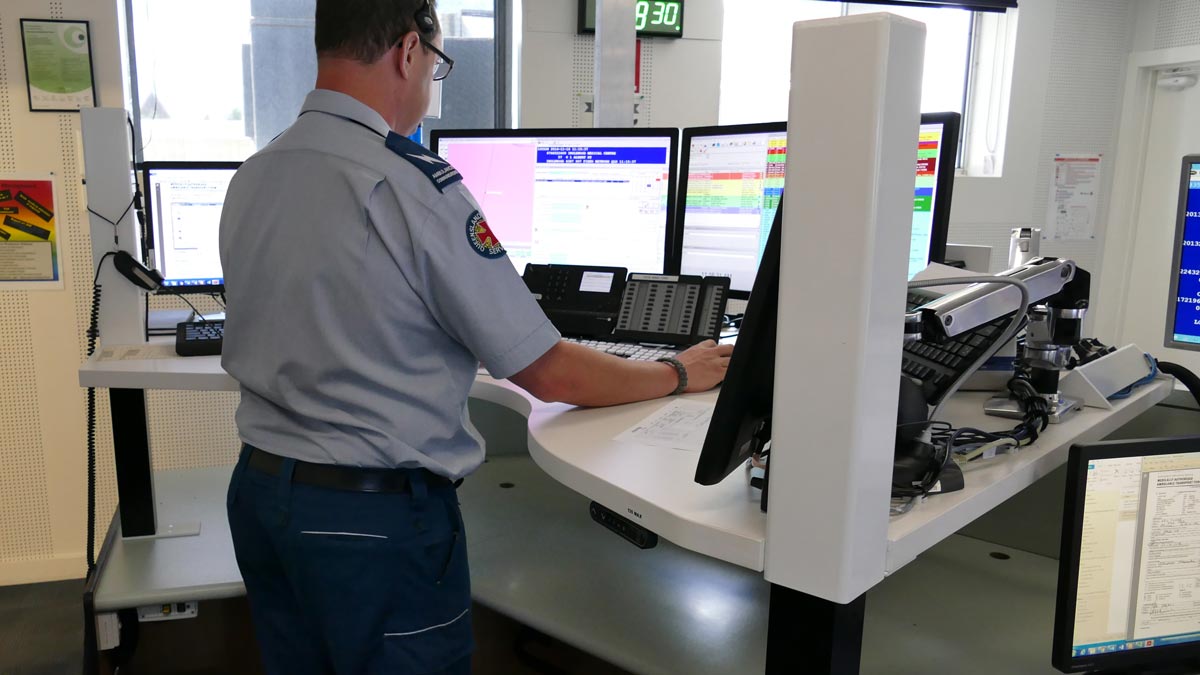 man standing at retrofit console